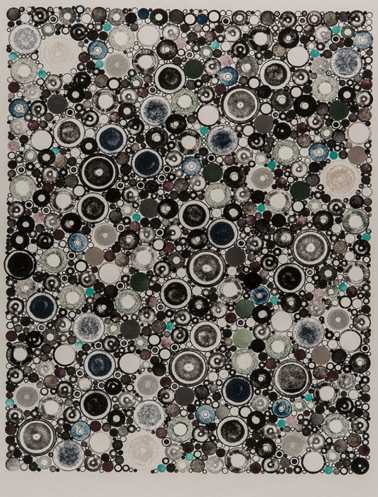 Shows an image of a painting with hundreds of circles in various sizes and shades of black, grey and green interspersed with dots of turquoise